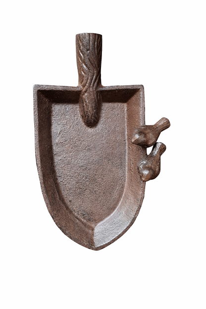 Decorative wooden tool with a bird design on a white background