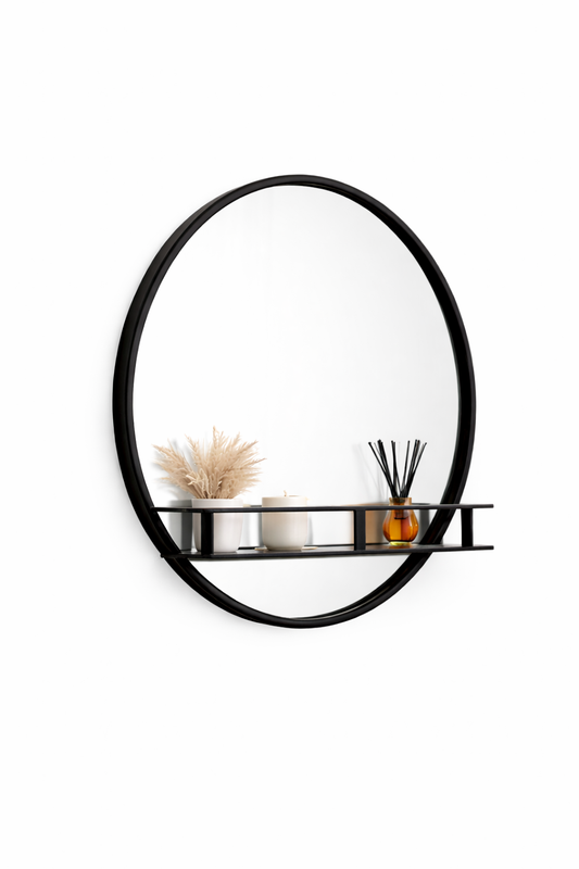 Round wall mirror with a black frame and shelf on a white background