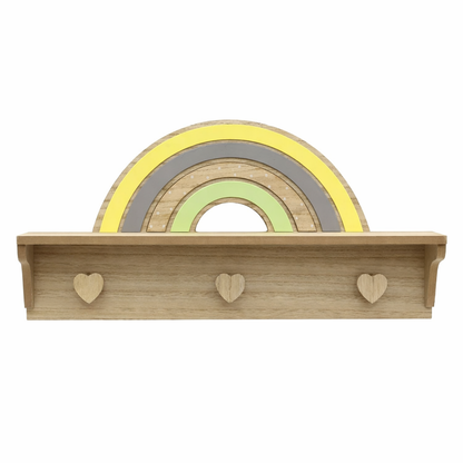 Wooden shelf with rainbow design and heart-shaped hooks on a white background