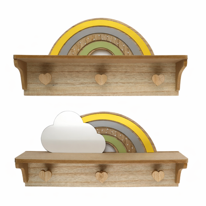 Wooden shelves with heart cutouts holding decorative plates and a cloud-shaped object on a white background