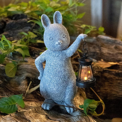 Close up of lantern held by solar rabbit statue