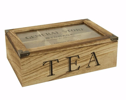 Wooden tea box with glass lid and 'TEA' engraving on a white background