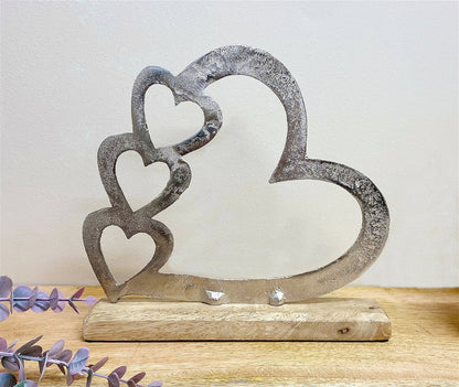 Metal Silver Four Heart Ornament On A Wooden Base Large